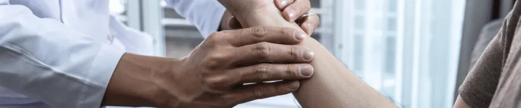 Chiropractor Applying Healing Techniques to a Patient in a Chiropractic Clinic