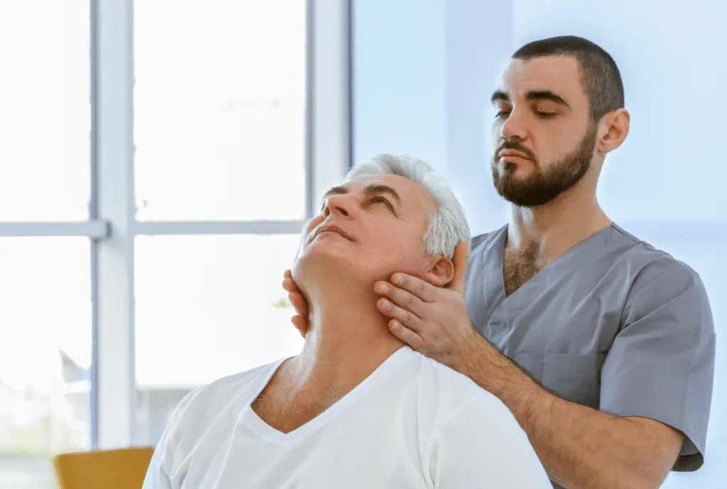 Family Receiving Chiropractic Consultation in a Welcoming Clinic Environment