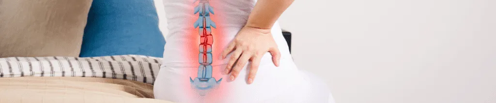 Chiropractor Assessing a Patient with Sciatica Symptoms in a Chiropractic Clinic