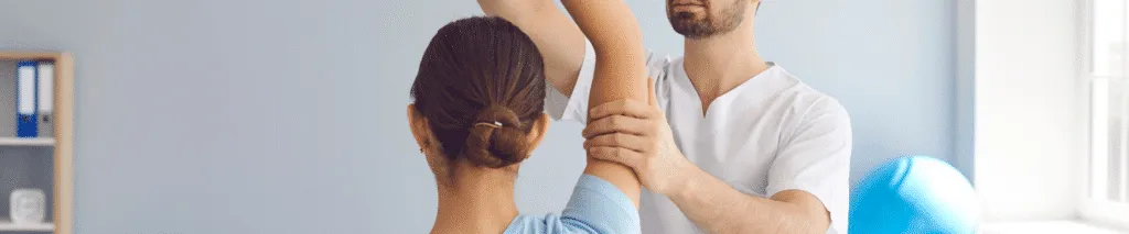 Chiropractor Providing Final Consultation to a Patient in a Comfortable Clinic Environment